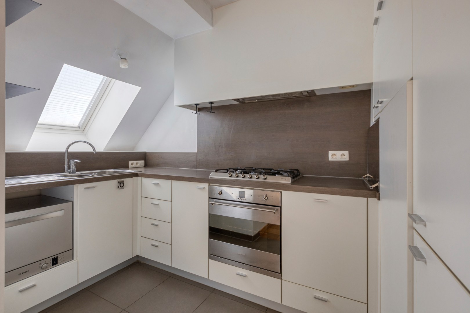 Energiezuinig dakappartement met 1 slpk. in het hart van Tessenderlo 