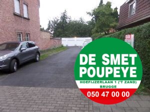 alt=oprit naar garage