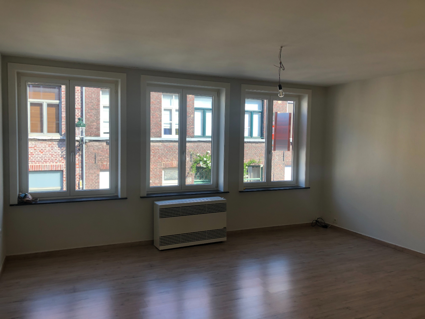 Centraal gelegen 1-slaapkamerappartement met garage 