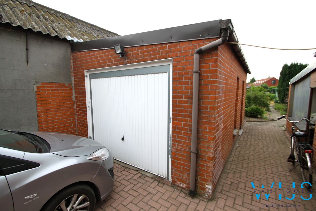 Centraal gelegen woning met mooie grond te Ertvelde! 