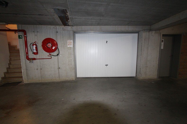 Gelijkvloers appartement met 2 slaapkamers en garage 