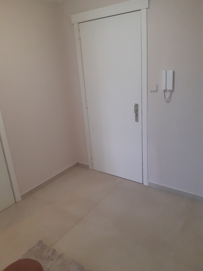 Ruim en lichtrijk appartement - centrum Gavere. 