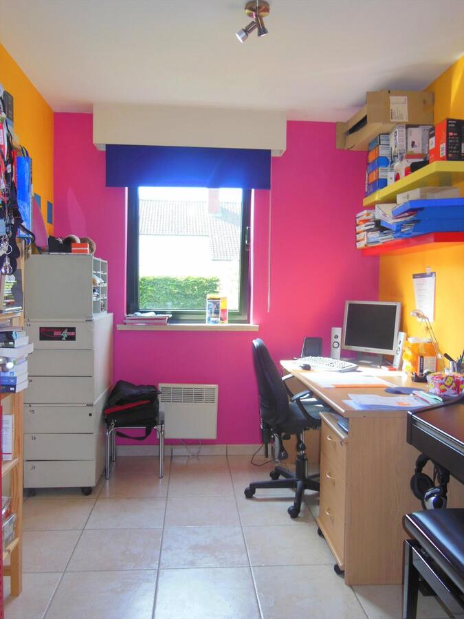 Gezellig gelijkvloersappartement met zonnige tuin en garage 