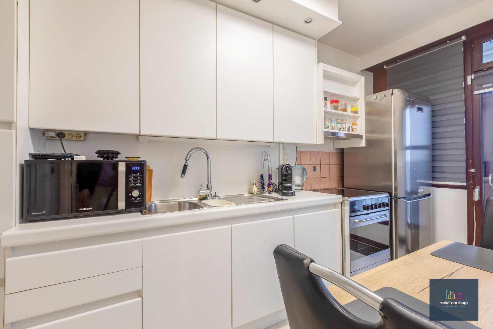 Ruim 2 slaapkamerappartement met garagebox nabij de Blaarmeersen 