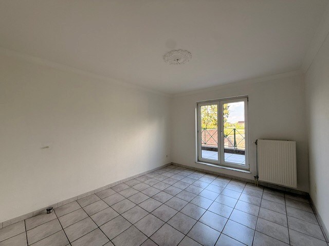 Prachtig appartement met 2 slaapkamers, terras en garage in het centrum van Dilsen 