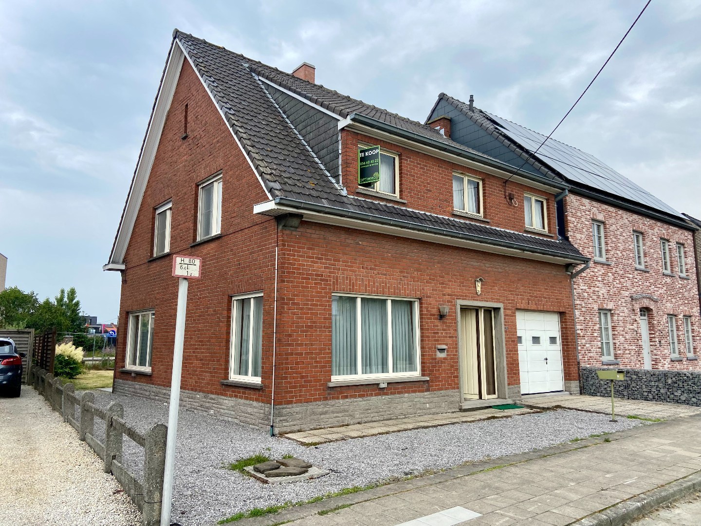 Degelijke te renoveren halfopen woning met tuin en garage op 293 m²! 