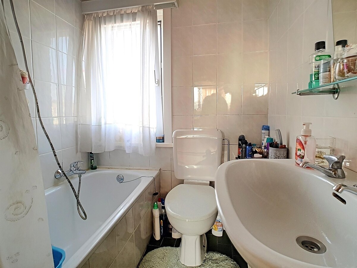 Dakppartement aan het marktplein te Heist 