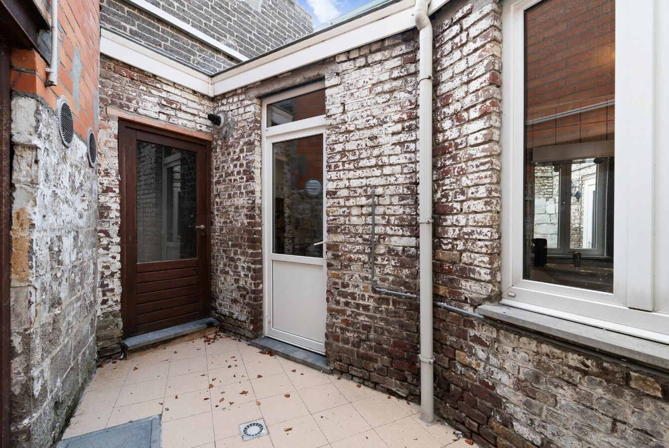 Handelswoning in centrum Zomergem! 