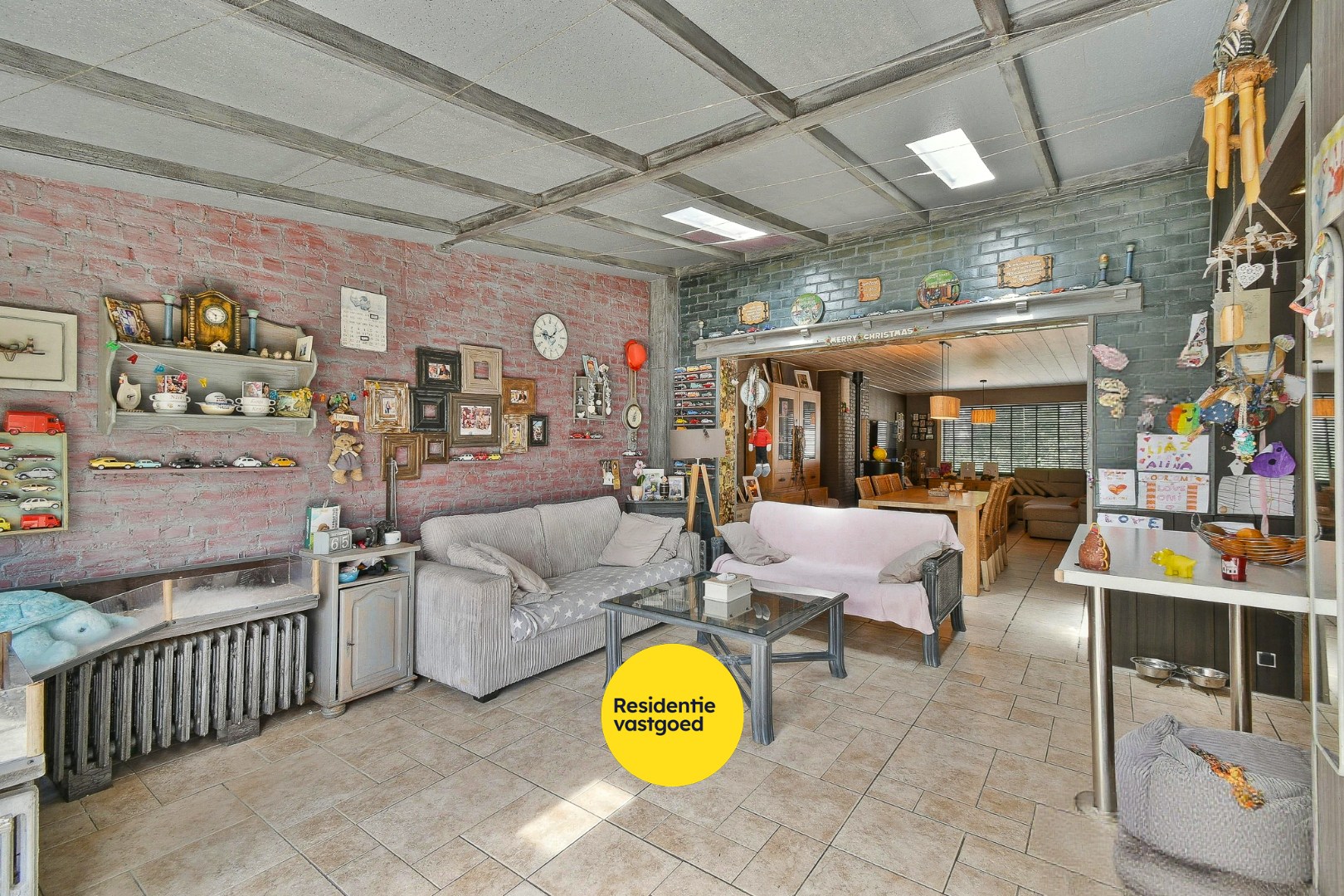 Woning met drie slaapkamers, garage en zonnige tuin 