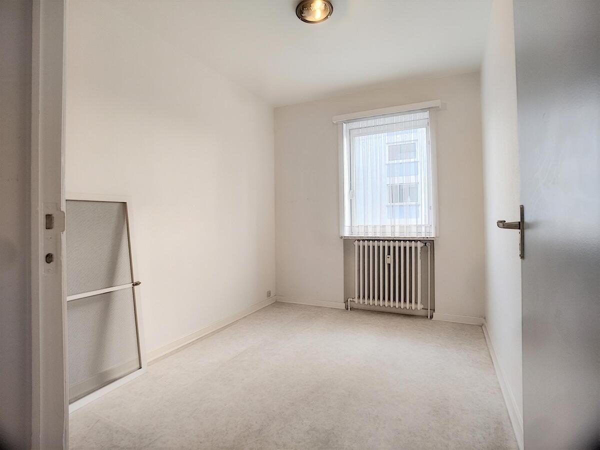 Een ruim (110m²), lichtrijk appartement MET garage op topligging aan het station - Brugge 