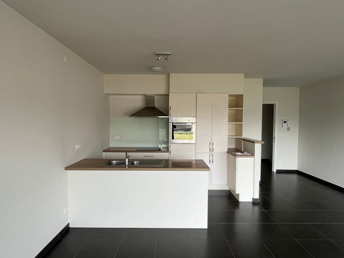 Hoogwaardig, eigentijds appartement met ondergrondse staanplaats 