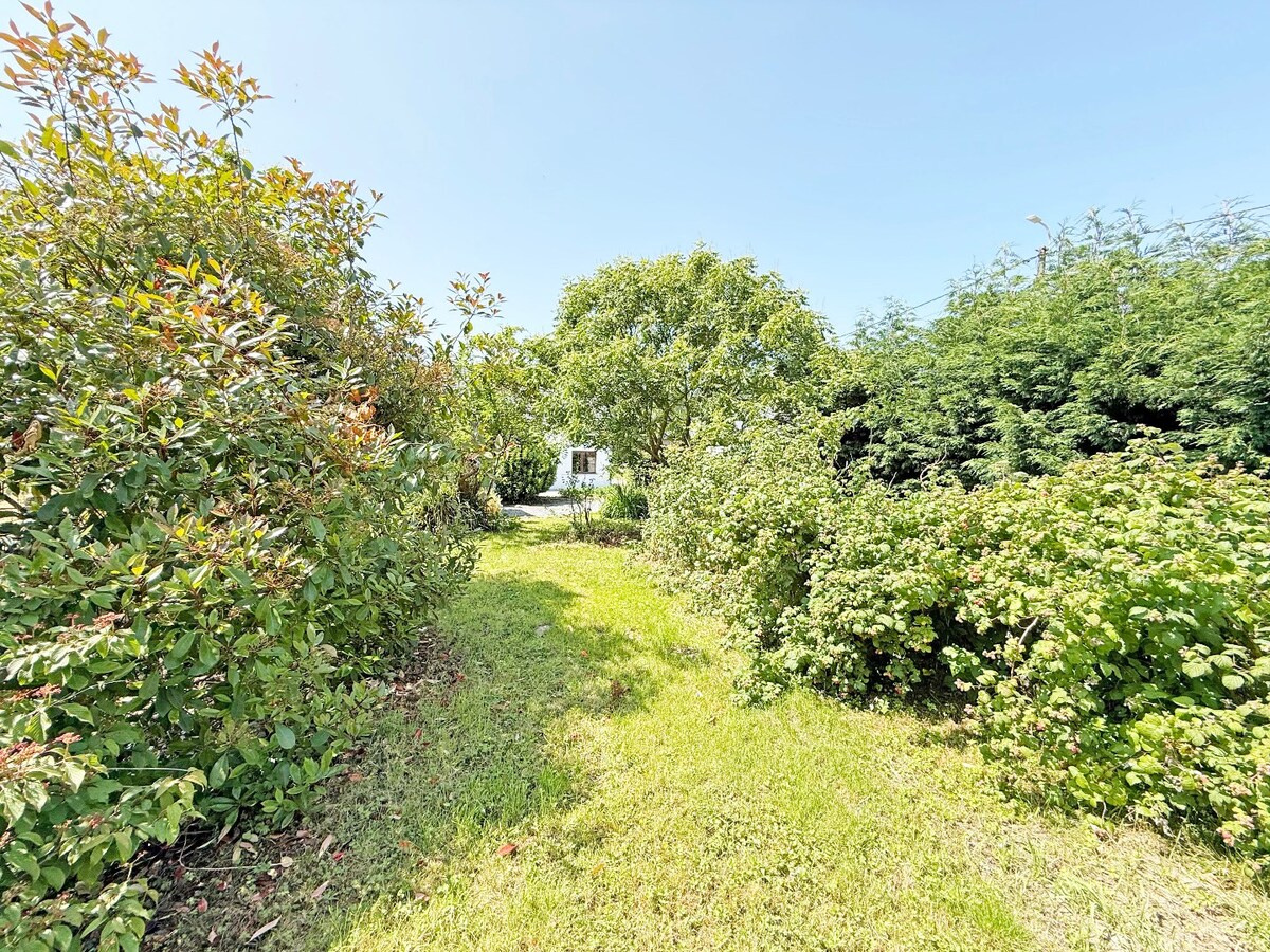 Rustig gelegen HOB met dubbele garage en tuin te Zwalm 