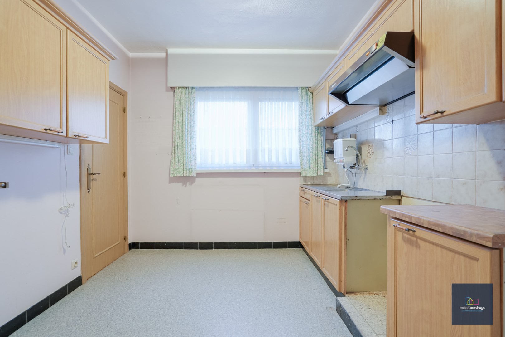 2 slpk. app met garage nabij centrum Wondelgem 