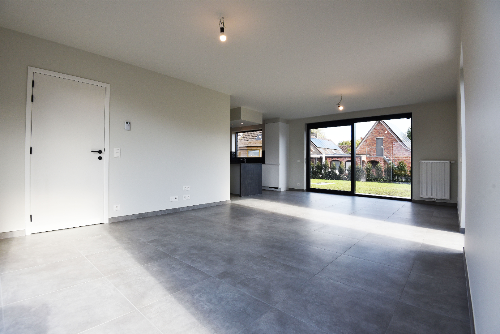 NIEUWBOUW open bebouwing (BEN-woning) met 3 slpks, carport, tuinhuis en tuin te Adegem 