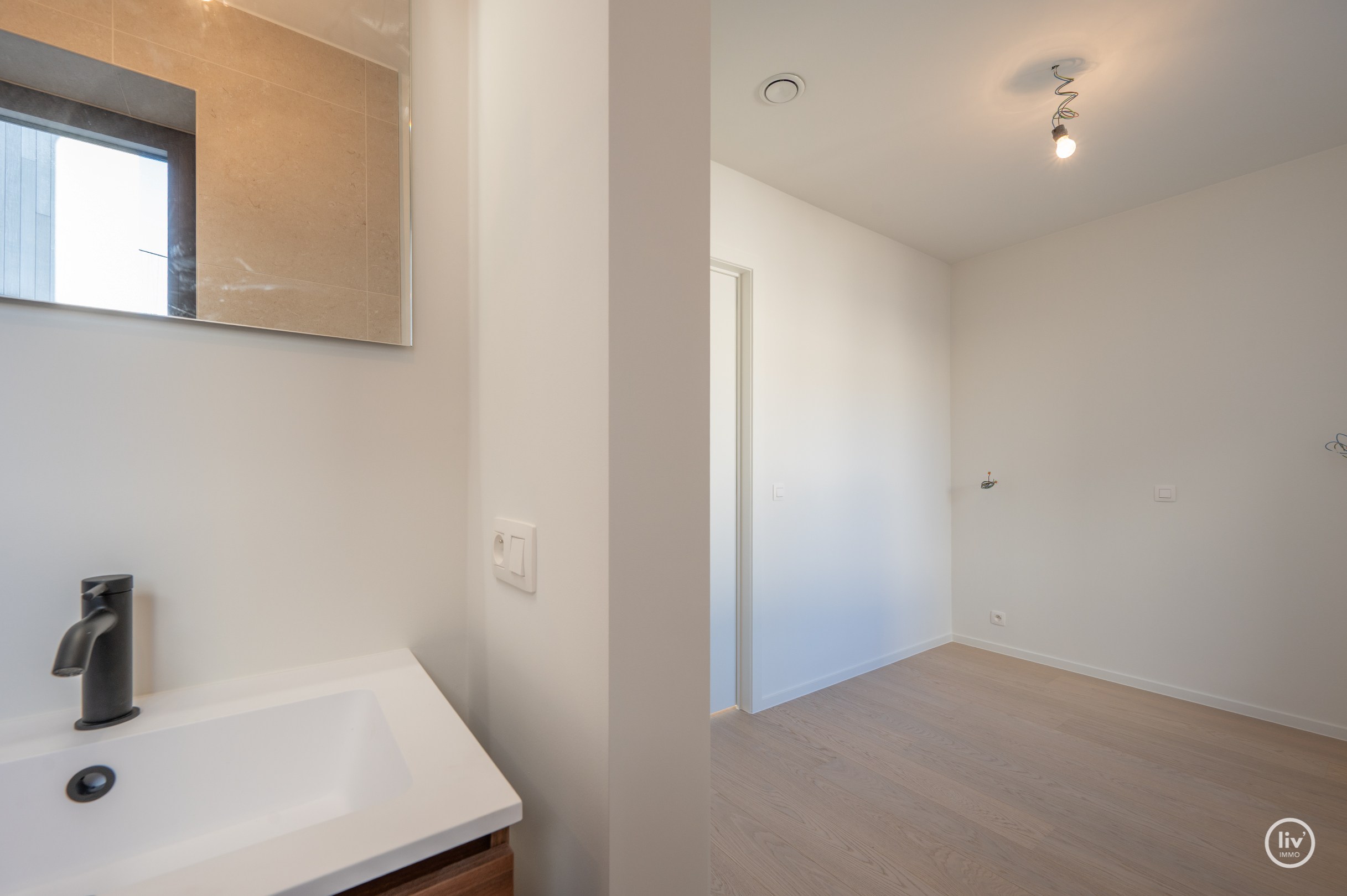 Centraal gelegen nieuwbouw-appartement in de residentie Maurice (met mogelijkheid tot aankoop van een inpandige autostaanplaats). 