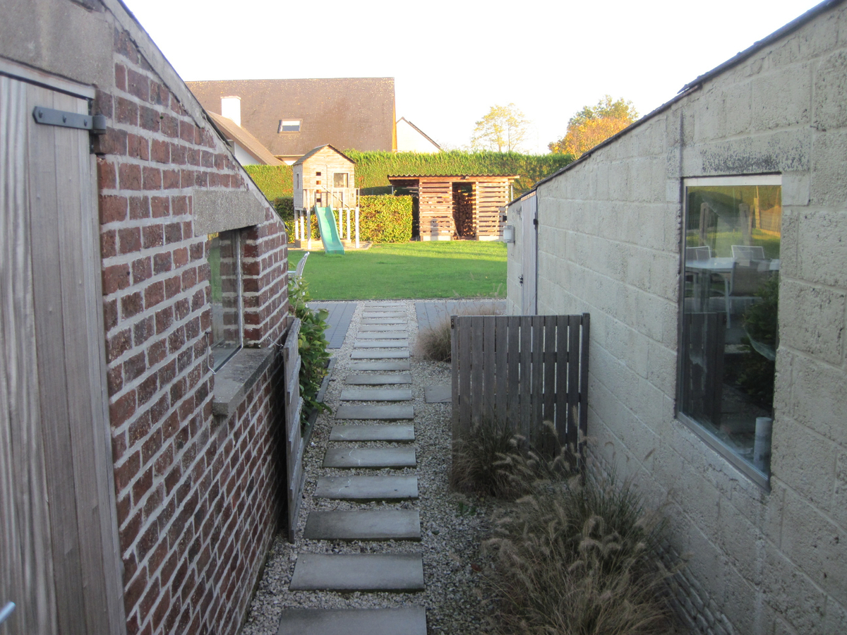 Degelijke én gezellige woning. Met tuin en met garage. 