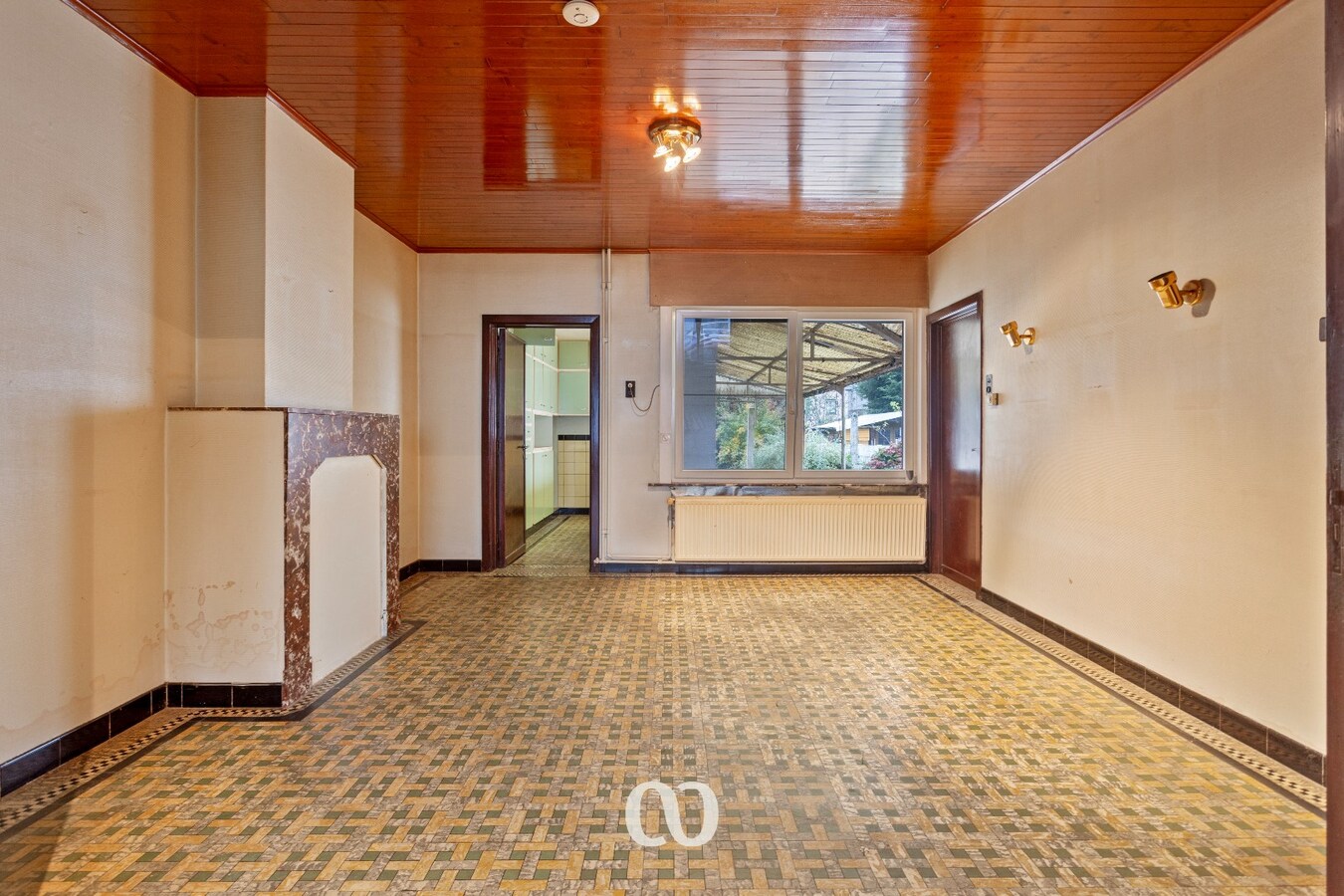 Te renoveren gezinswoning met mooie tuin in Oudenaarde 