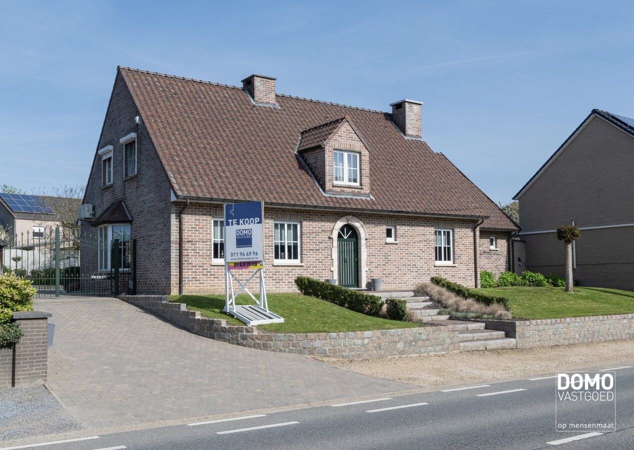 Karaktervolle en ruime gezinswoning in pastorij-/fermettestijl met prachtige tuin en 4 slaapkamers in het groene Kortessem 