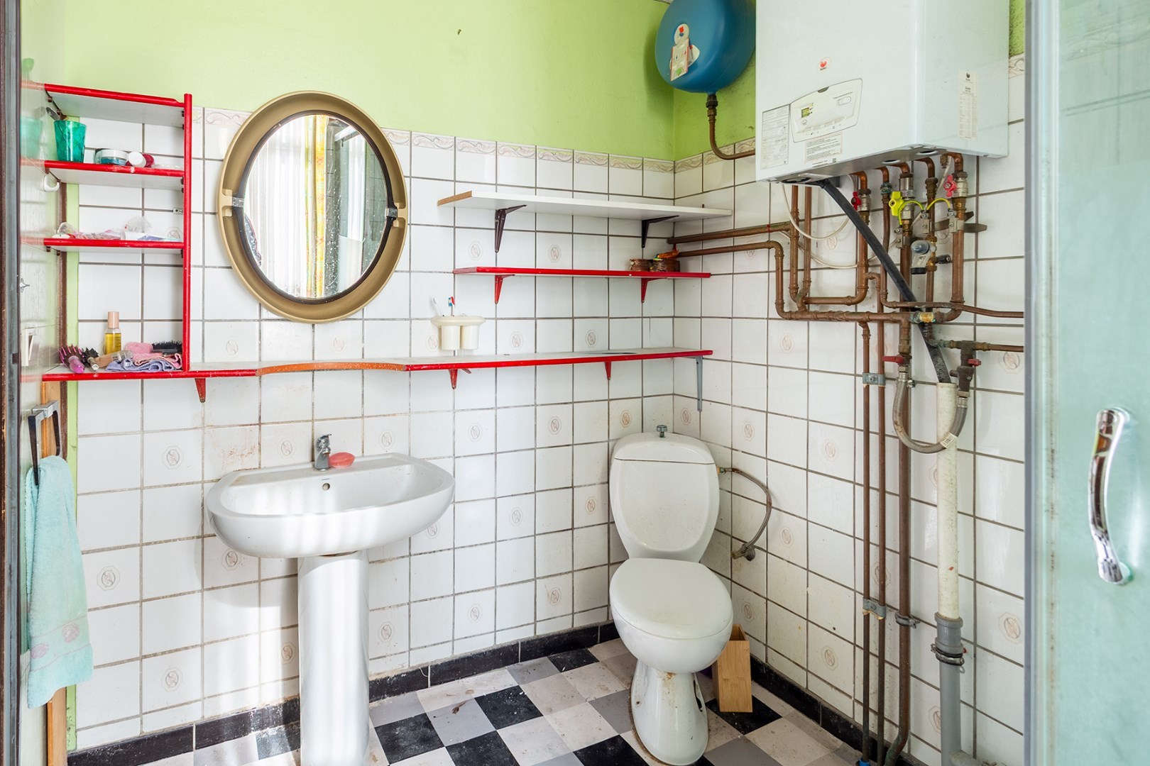 Unieke renovatiewoning met karakter en potentieel in hartje Ledeberg 