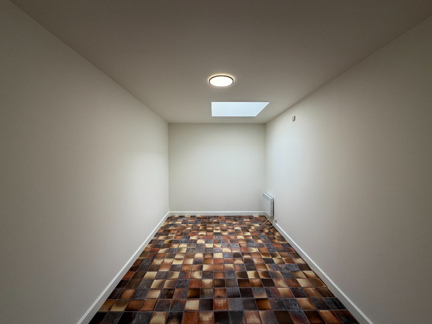 Ruime woning met twee slaapkamers en garage te Sint-Eloois-Vijve 