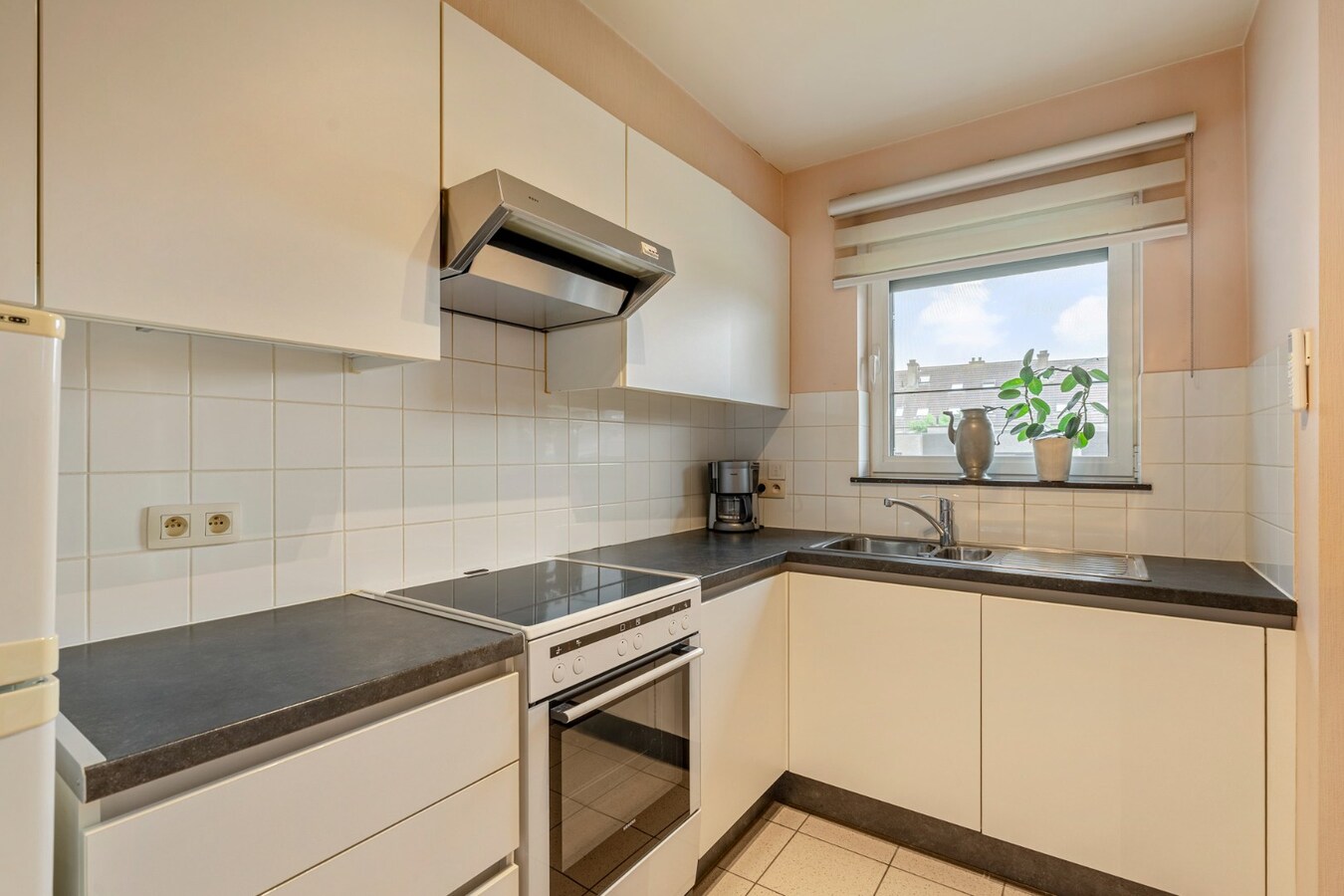 Comfortabel appartement met 1 slaapkamer, terras en autostandplaats nabij het centrum van Maaseik! 