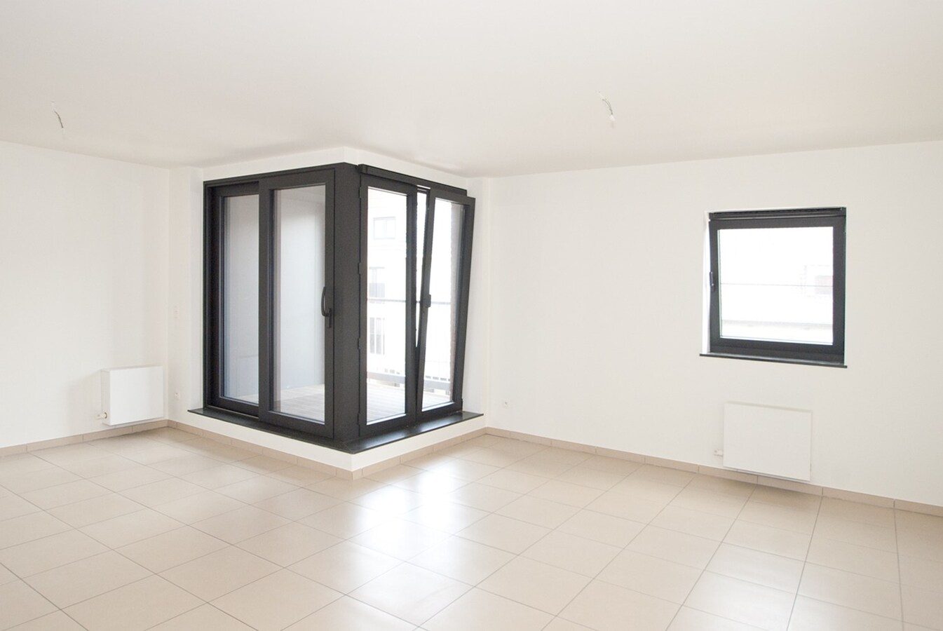 Instapklaar appartement - 2 slpks - lift - 2 terrassen - parking 