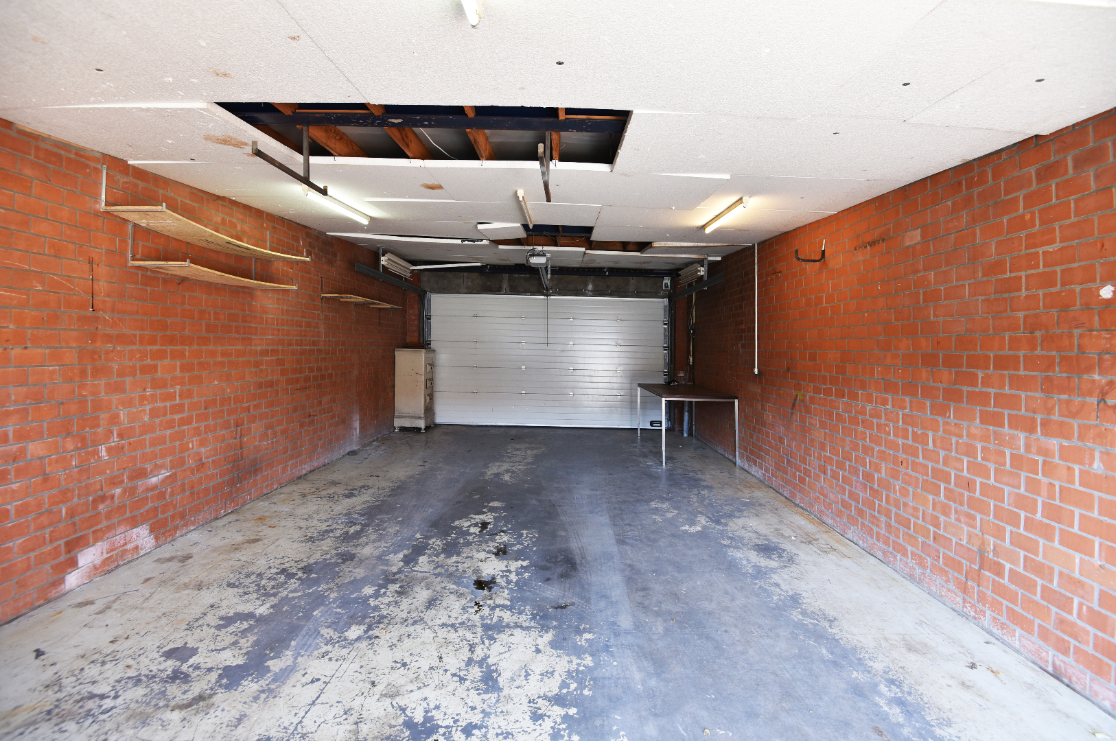 Op te frissen woning met 2 slpks, garage (55m²) en tuin te Balgerhoeke 