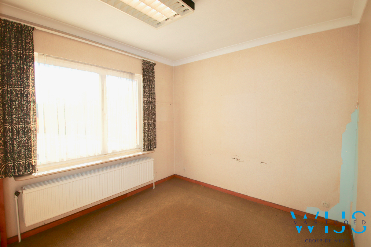 Te renoveren gezinswoning op een zonnig perceel van 1184m² te Wachtebeke ! 