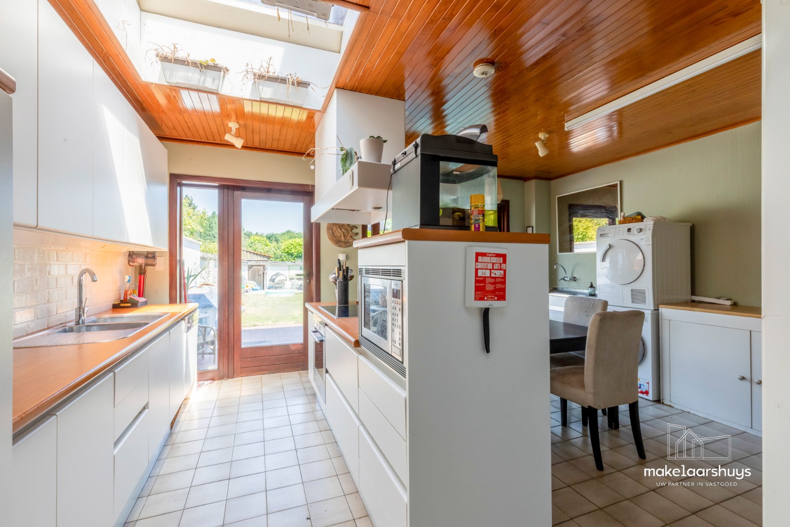 Ruime woning met 4 slpk en aangename tuin te Sint-Amandsberg 