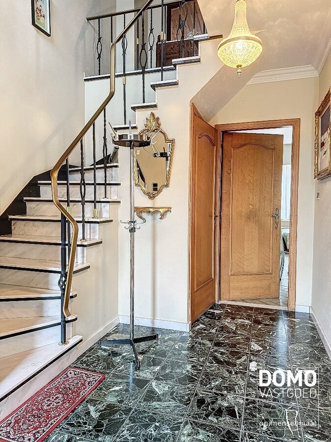 Charmante woning met ruime tuin en inpandige garage, rustig gelegen te Spalbeek. 