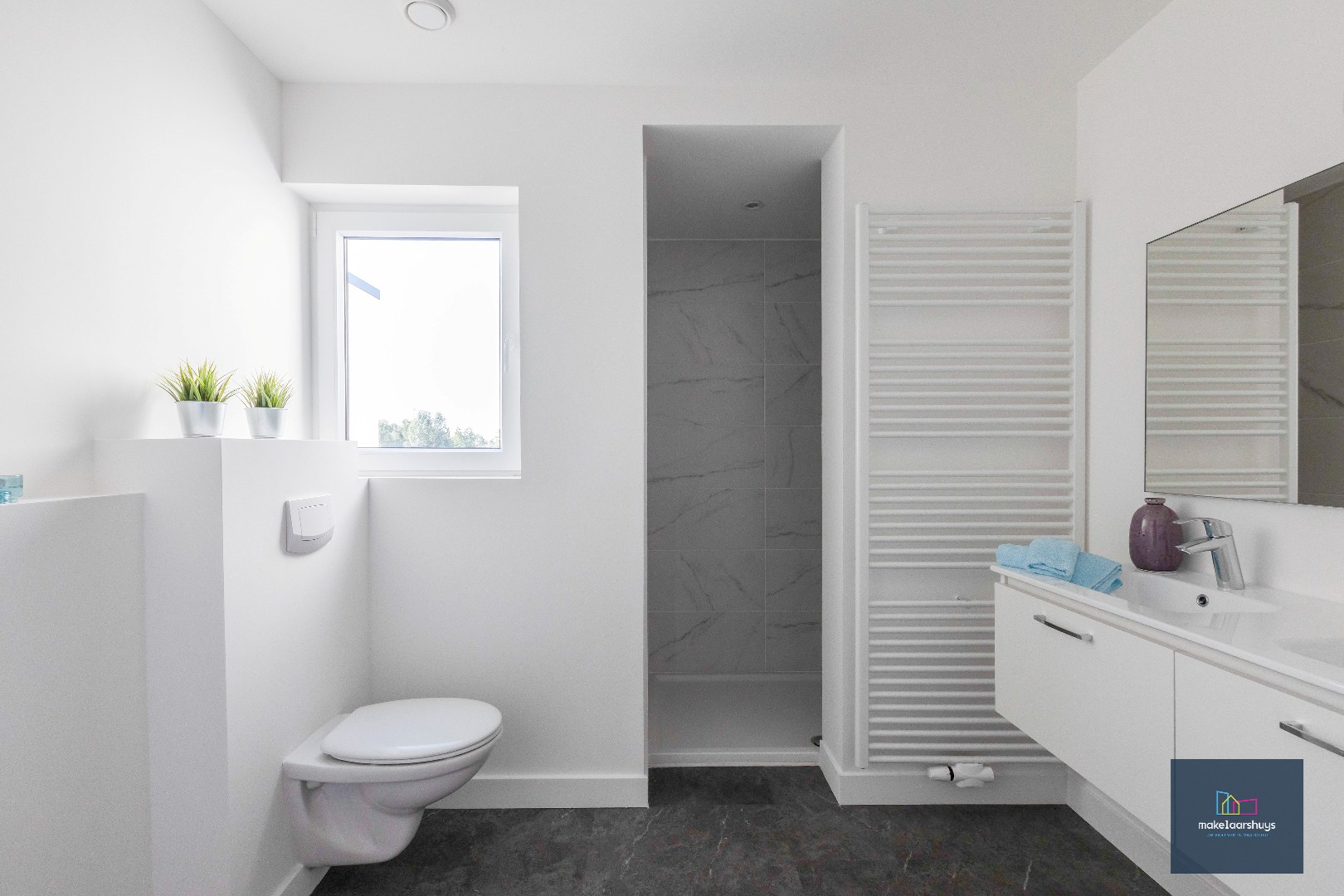 Instapklare energiezuinige woning met 3slpk tuin en staanplaats 