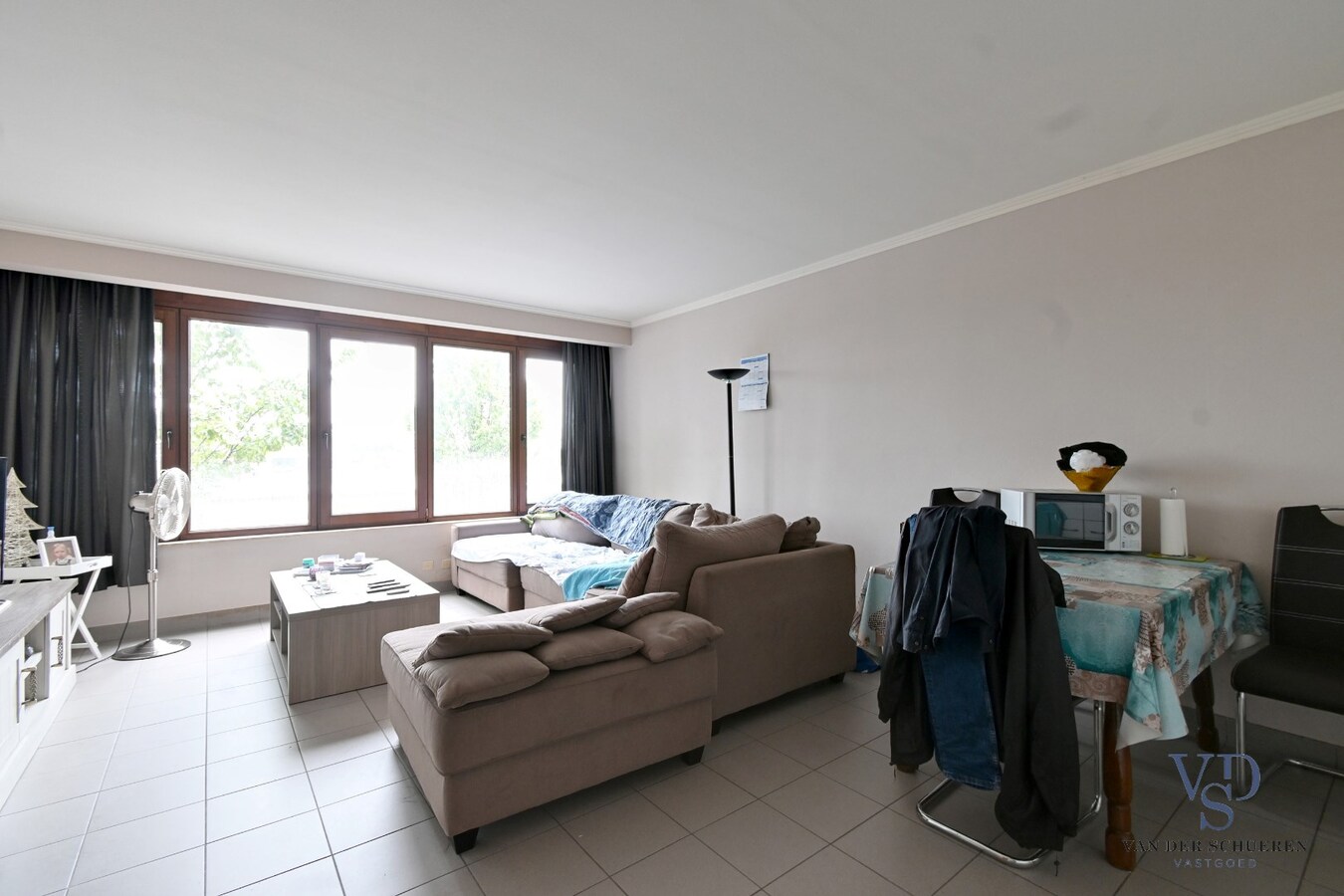 Degelijk investeringsappartement met garage. 