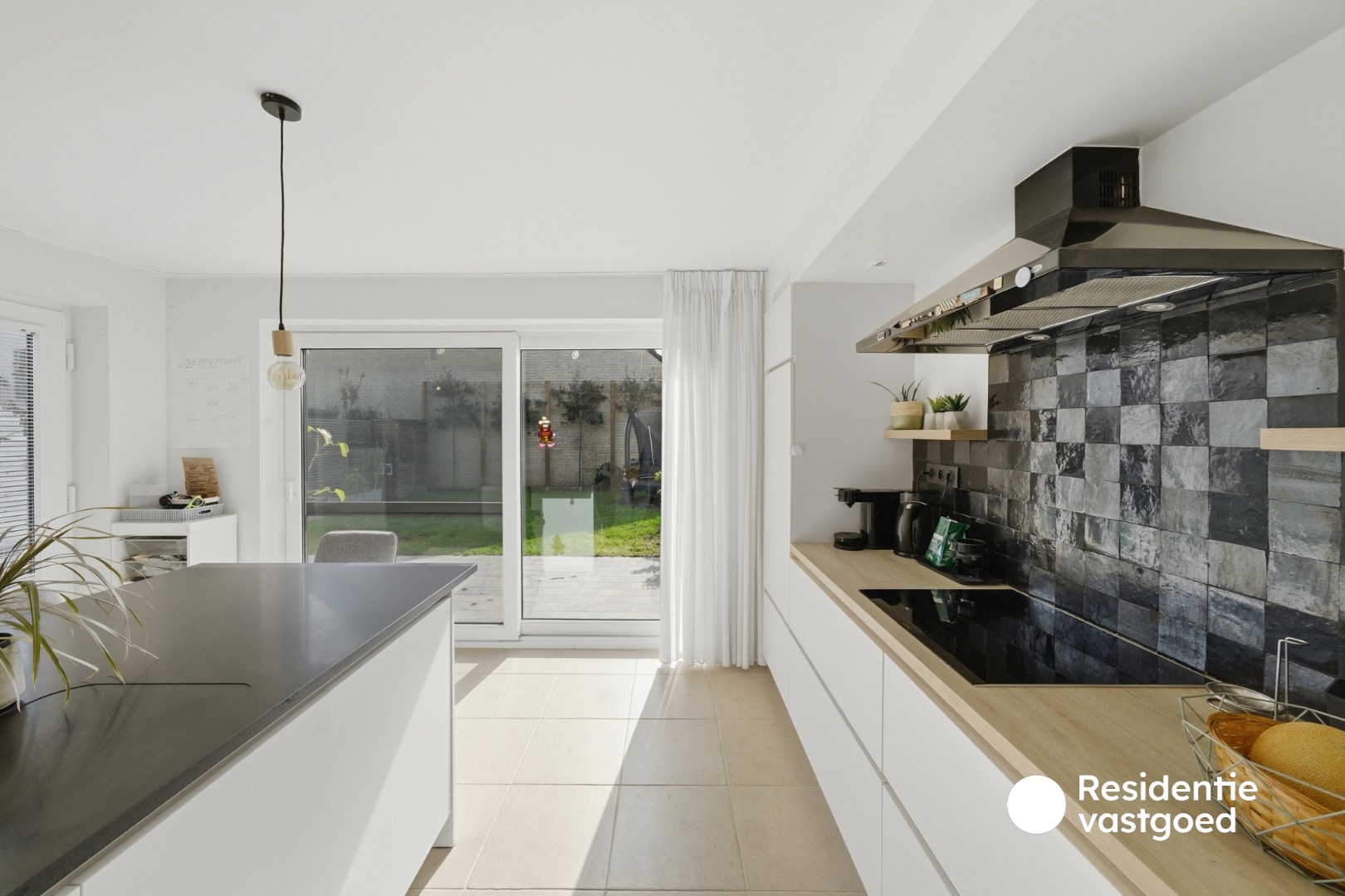 Instapklare woning te koop met garage en tuin! 
