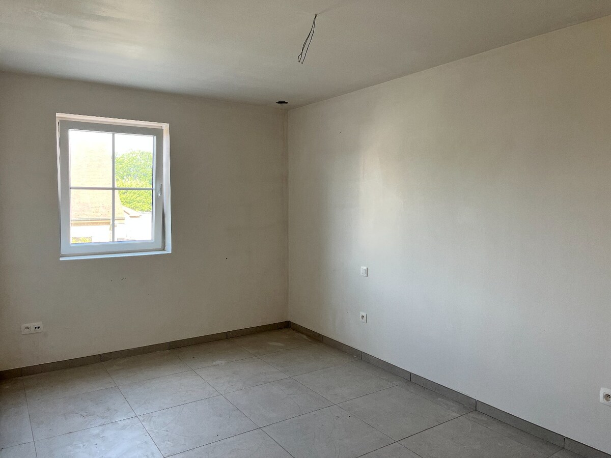 Instapklare nieuwbouwwoningen met garage en autostaanplaats te Langemark 