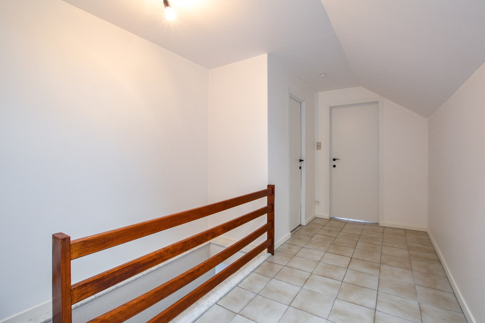 Duplex appartement met 2 slpks en 2 garages in centrum Eernegem 