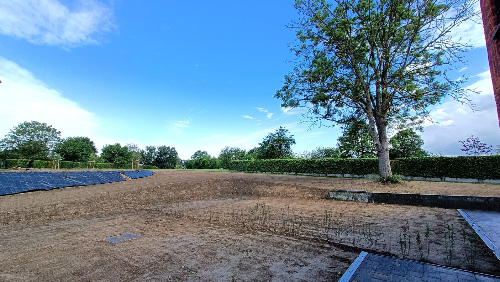 Nieuwbouwappartement met tuin en terras 