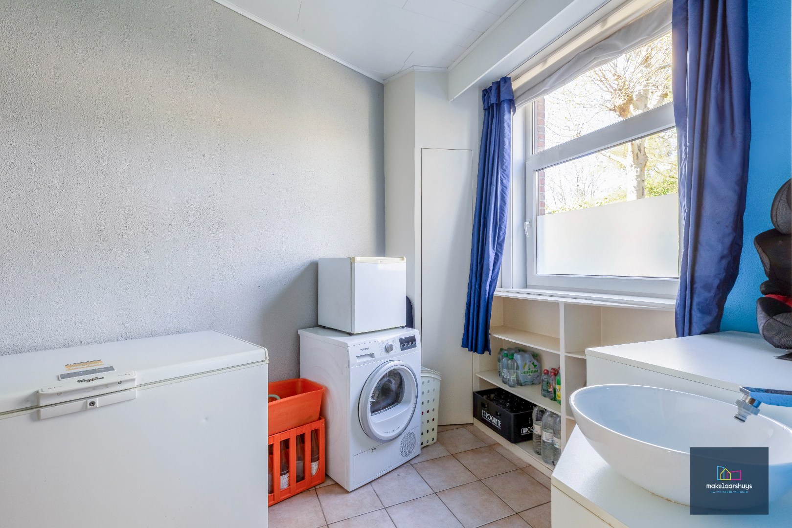 Goed onderhouden en ruime woning in rij met tuin/terras te Wondelgem 