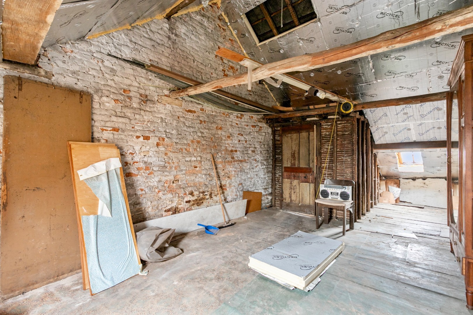 Handelspand met woonst te Halle-centrum 