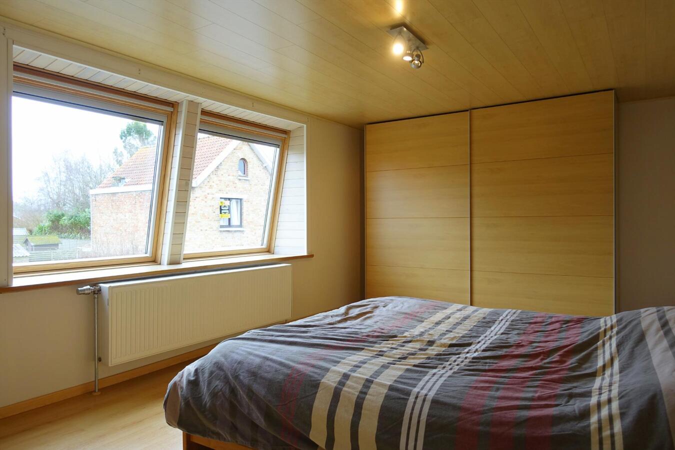 Centraal gelegen half-open woning 