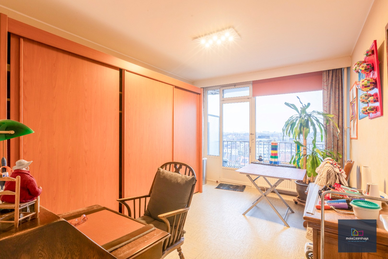 Ruim 2 slaapkamerappartement met garagebox nabij de Blaarmeersen 