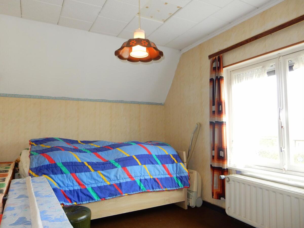 Alleenstaande woning met garage en mooie tuin 