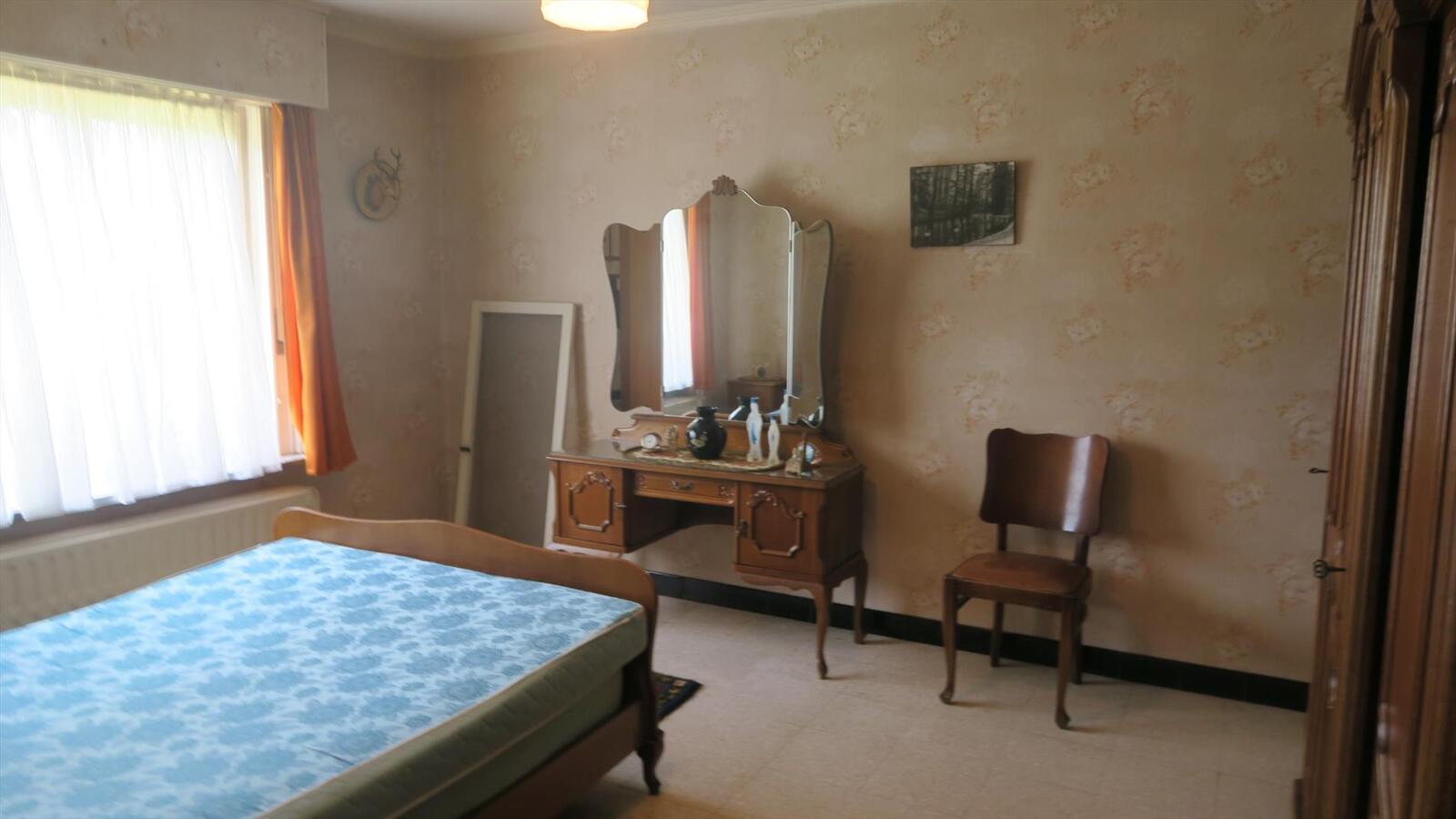 Degelijke open woning op ruim perceel van 843m² 
