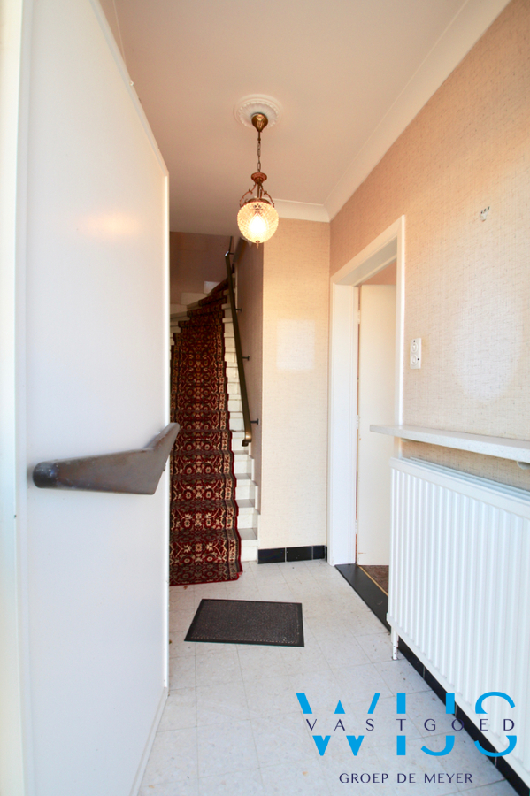 Te renoveren gezinswoning op een zonnig perceel van 1184m² te Wachtebeke ! 