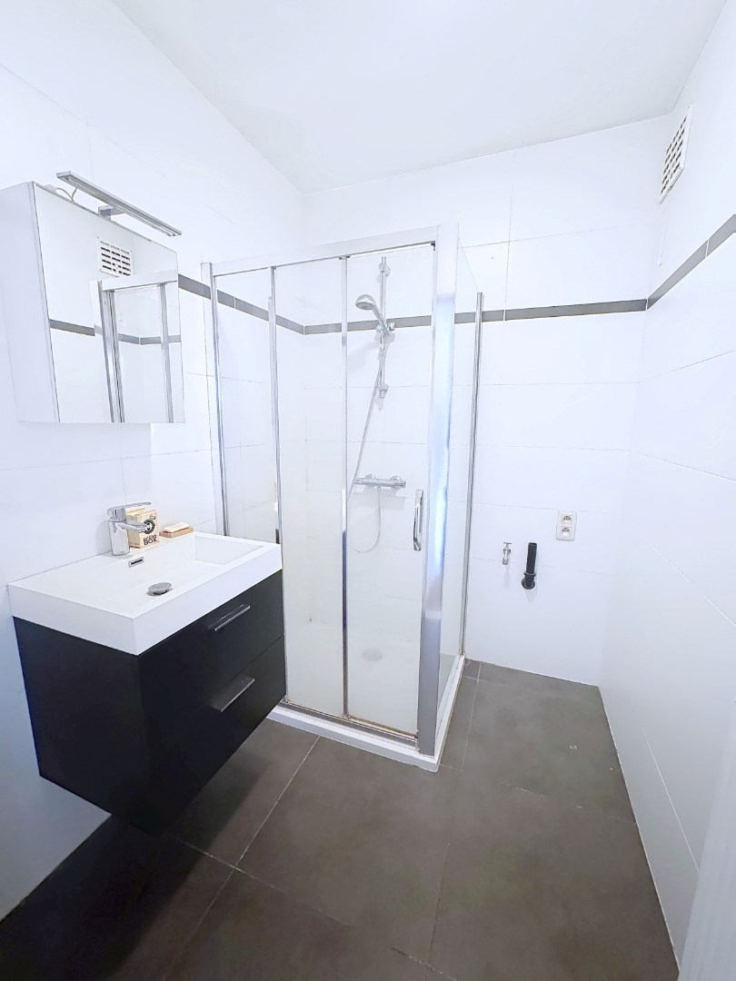 Appartement met slaaphoek en zonnig terras gelegen aan de Coupure 