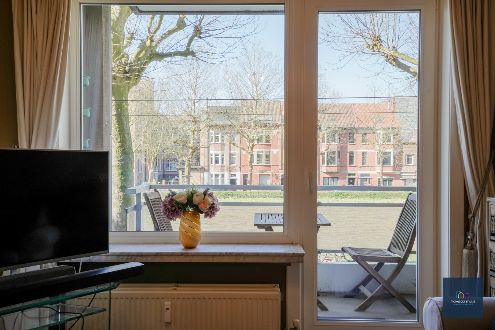 Stijlvol 1 slaapkamer appartement met 2 terrassen, kelder en garagebox 