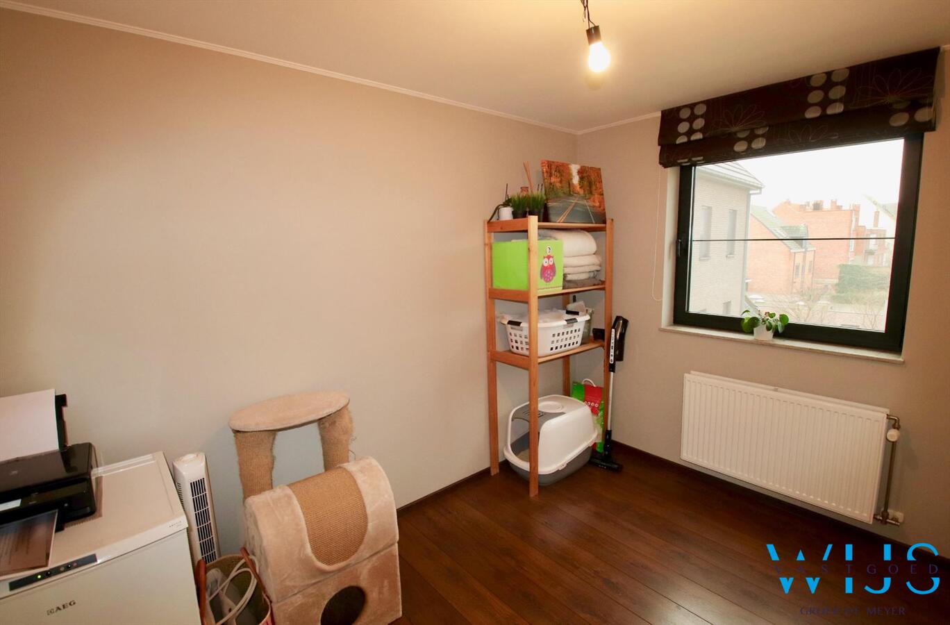 Charmant instapklaar tweeslaapkamer appartement in centrum Ertvelde! 