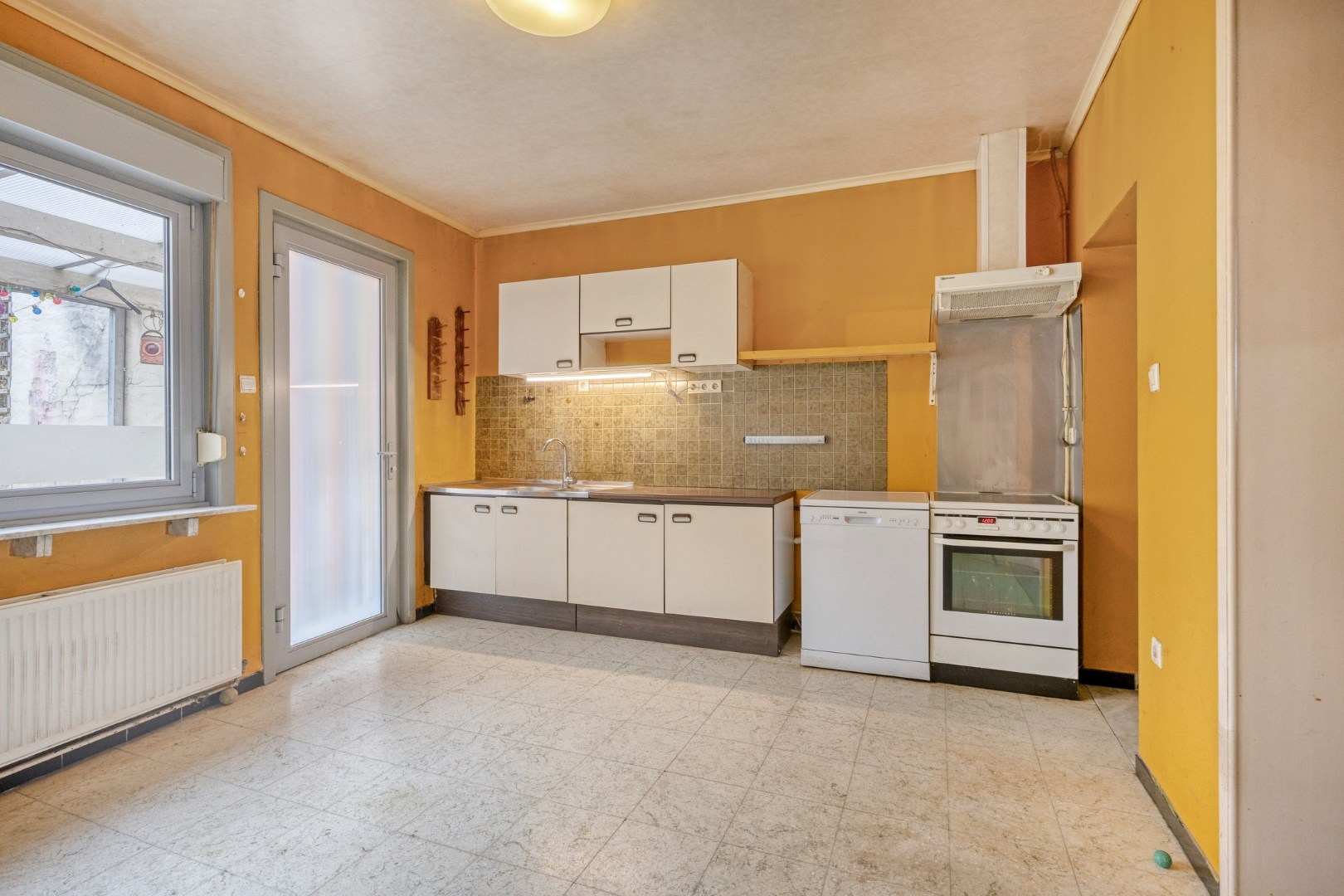 Ruime woning met kelder, zolder en tuin in Kessel-Lo! - EPC 443 kWh/m² - bewoonbare opp. 205 m² 