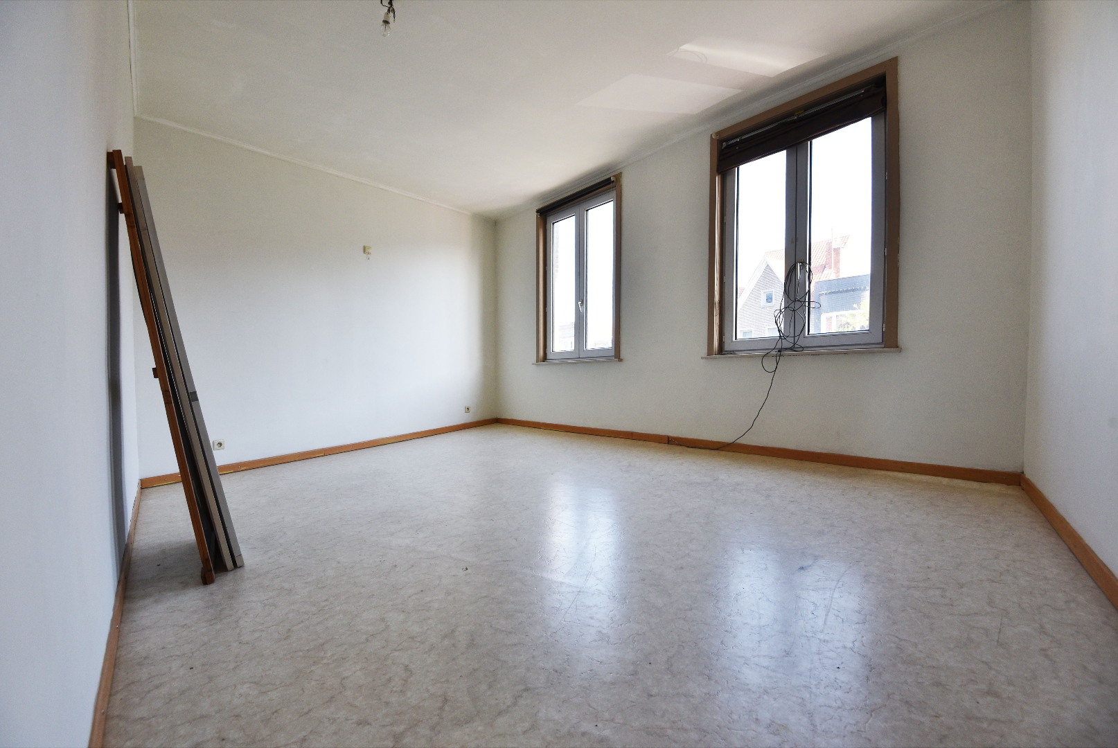 Rijwoning met 2 slpks en tuin te Eeklo 