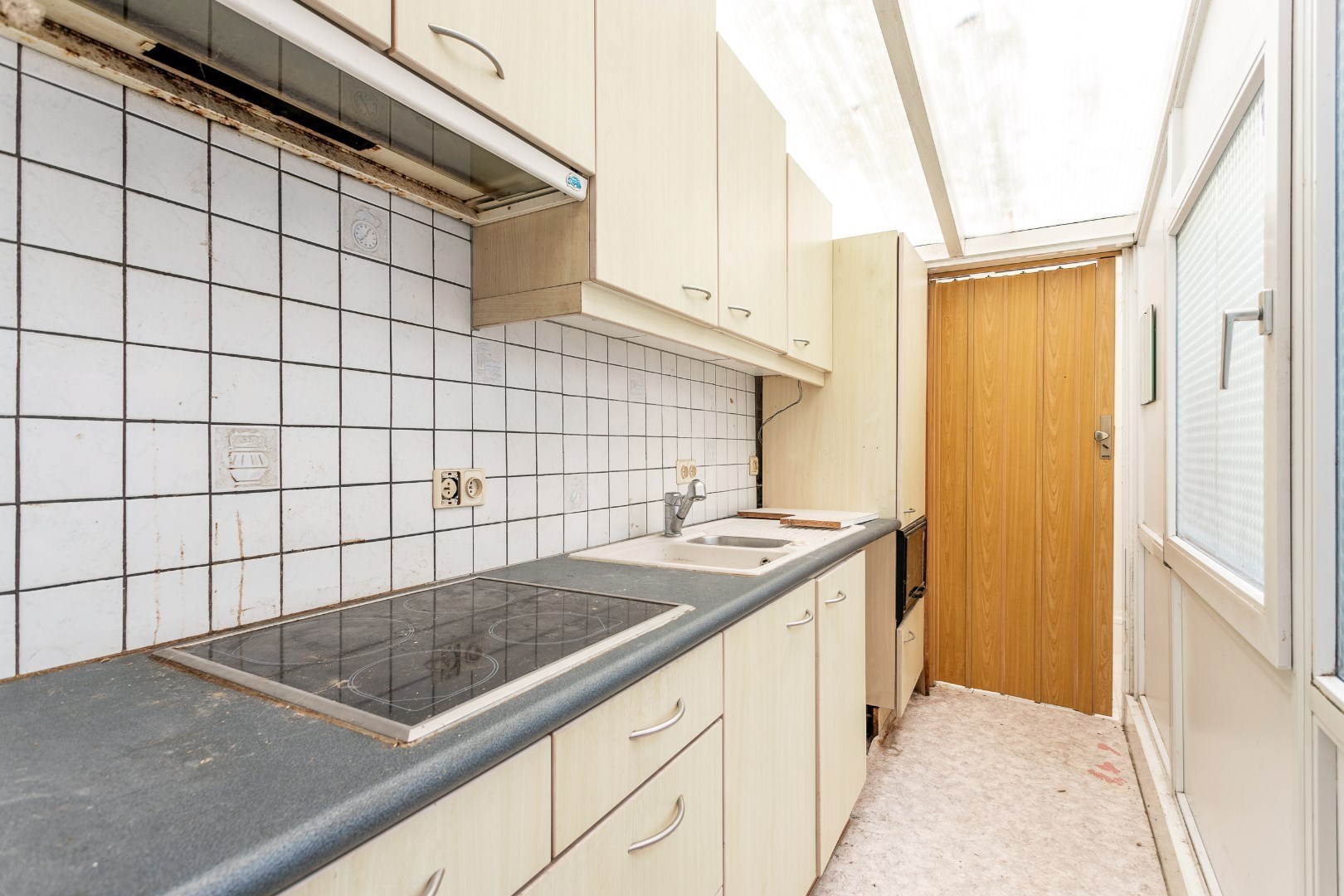 Handelshuis én appartement centrum Halle 