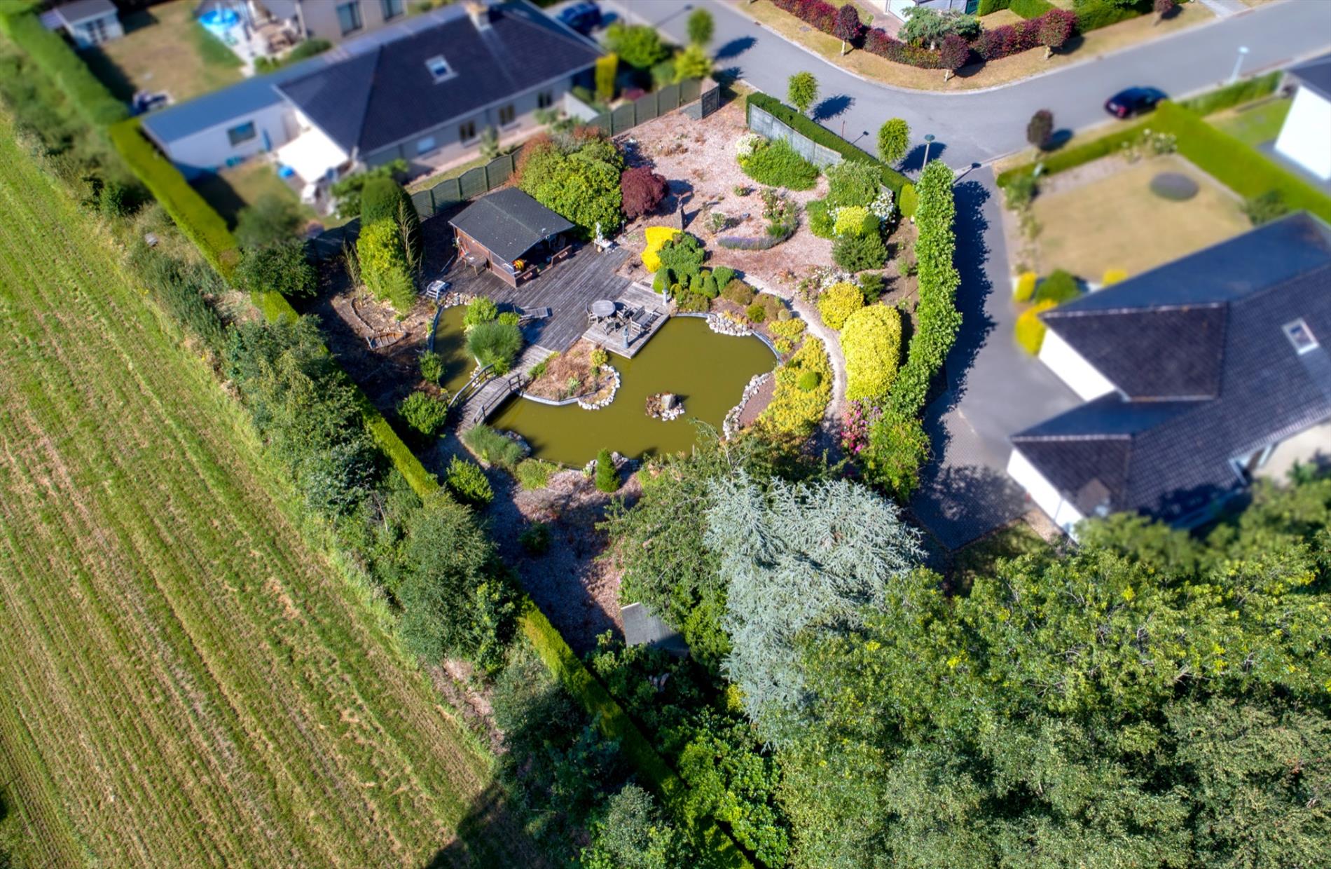 Westelijk georiënteerd lot bouwgrond 1.223m² in residentiële "bloemenwijk" te Maldegem 